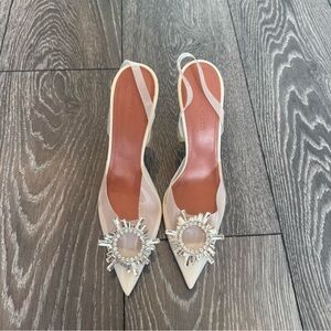 Amina Muaddi Ivory Pointed Slingback Heels with Crystal Sunburst